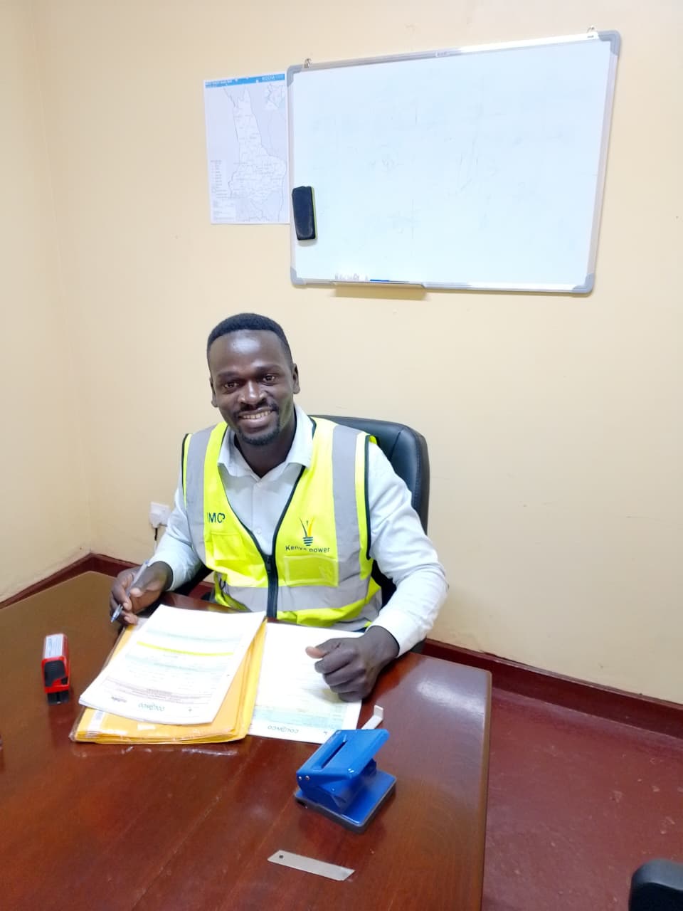 Eng. Samson Arenchi, Managing Director of Gigam Tech Limited, at his desk